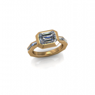 Gold ring with a rectangular blue gemstone and side accents on a white background