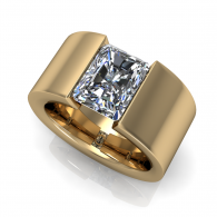 Gold ring with a square-cut clear gemstone set in a wide band on a white background