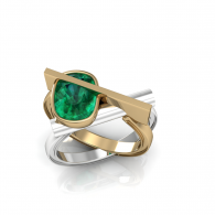 Interlocking gold and silver ring with a green gemstone on a white background