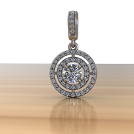 Round diamond halo pendant in silver and rose gold on a reflective surface