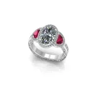 Silver ring with oval clear gemstone and two red side stones on a white background