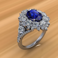 Silver ring with a large blue gemstone surrounded by small diamonds on a warm blurred background