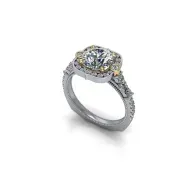Silver ring with a round diamond halo and smaller side stones on a white background