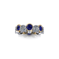 Gold ring with blue and clear gemstones in a row