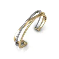 Gold and silver metal bracelet with a curved, open design on a white background