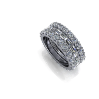 Silver diamond-studded ring set with multiple rows of sparkling stones on a white background