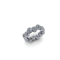 Silver ring with five round diamond-like stones on a white background