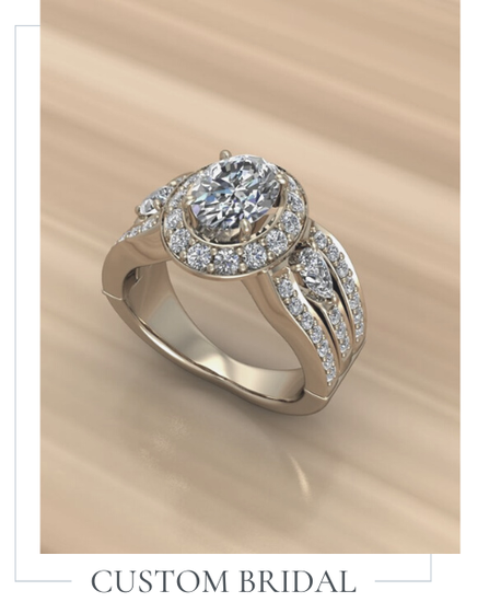 Silver bridal ring with round center diamond and pavé band on a beige background
