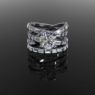 Silver diamond ring on a glossy black surface, reflected below.