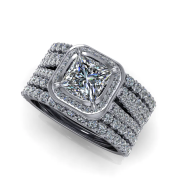 Diamond-studded silver ring with a square center stone and layered band