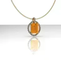 Gold pendant necklace with orange gemstone and oval frame against white background