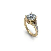 Gold ring with a round diamond halo and side stones on a white background