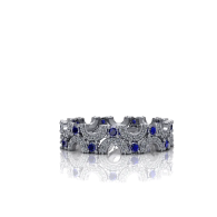 Silver and blue jeweled crown on a white background