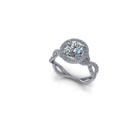 Silver diamond ring with halo setting and twisted band on a white background