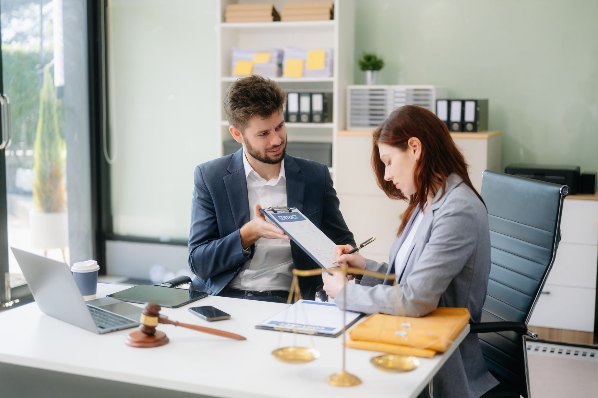 Model building on a desk during a business meeting