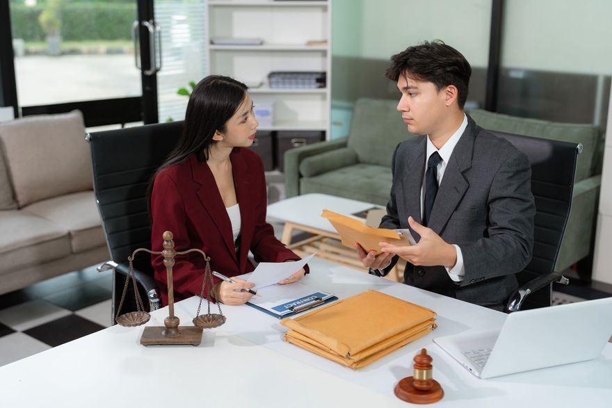 Model building on a desk during a business meeting