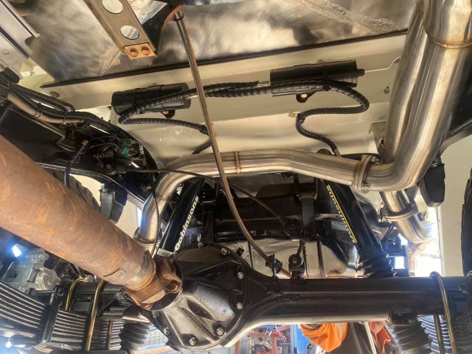A Close Up of the Underside of a Car With a Exhaust Pipe — RK Diesel Services in Modbury, SA