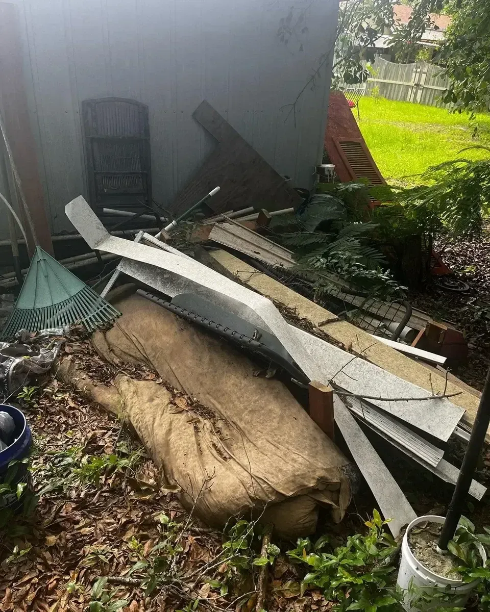 building waste and other jun beside shed, yard cleanouts in atlanta