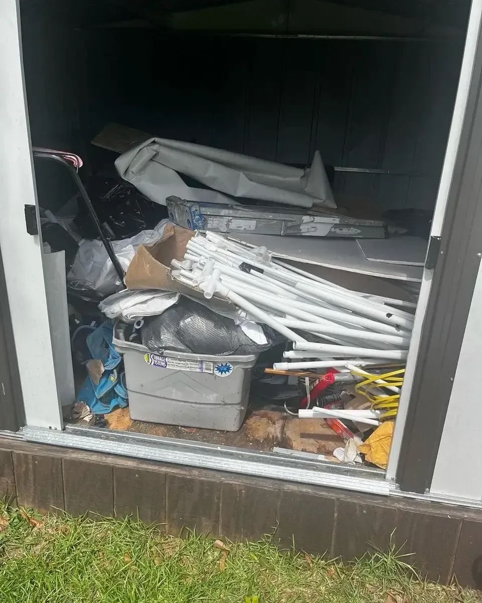 junk in white shed, shed cleanouts