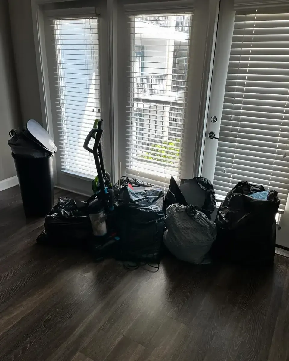 trash bags and other junk in home after moving, moving cleanouts in Atlanta

