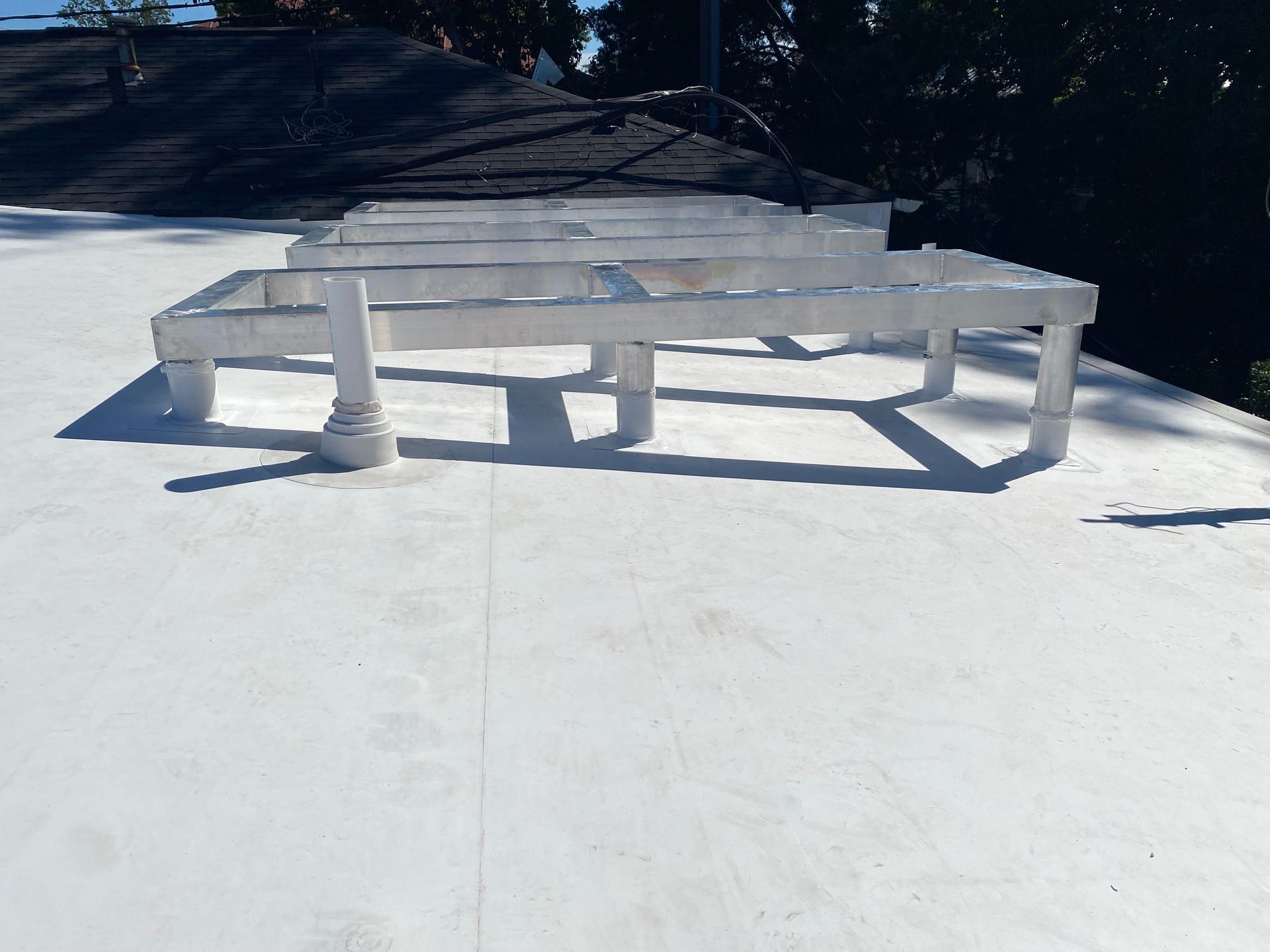 Aluminum Framework On A White Flat Roof