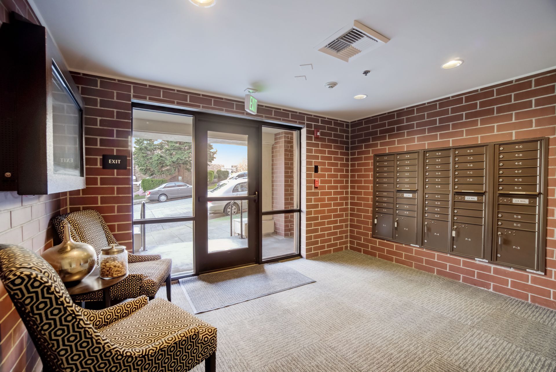 A brick building with a lot of mailboxes in it