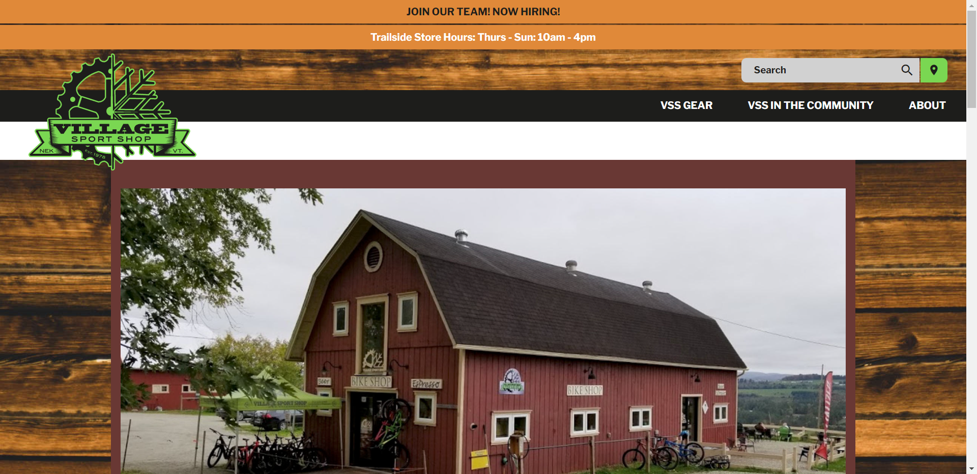 Website of Village Ice Cream, featuring a red barn, and dark gray roof.