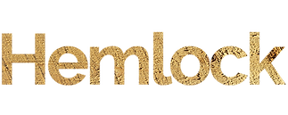The word hemlock is written in cork on a white background