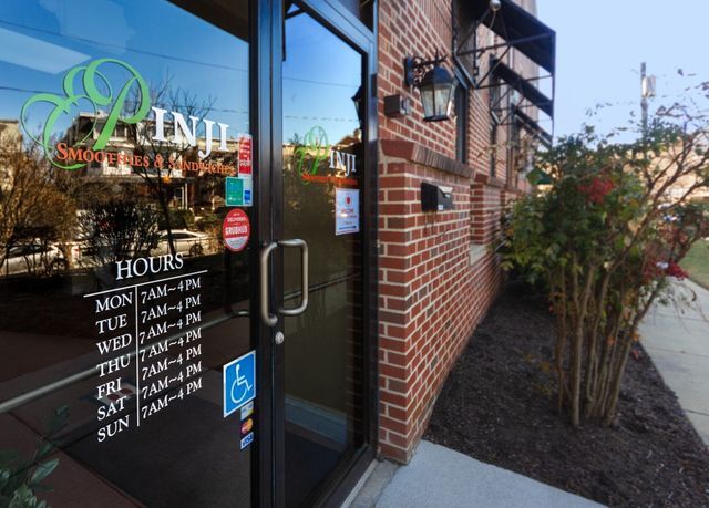 Pinji's Cafe front store glass door