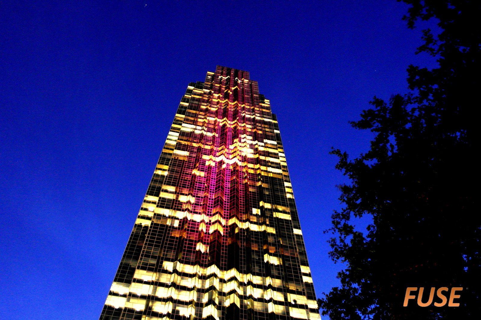 A tall building with fuse written on the bottom