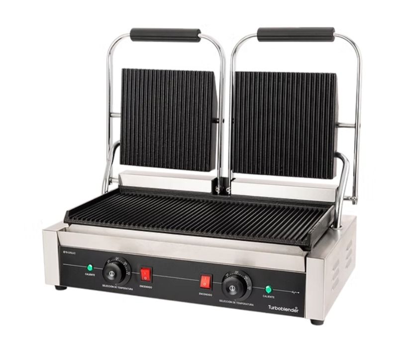 Parrilla para paninis de acero inoxidable con placas abiertas acanaladas y asas negras sobre fondo blanco.