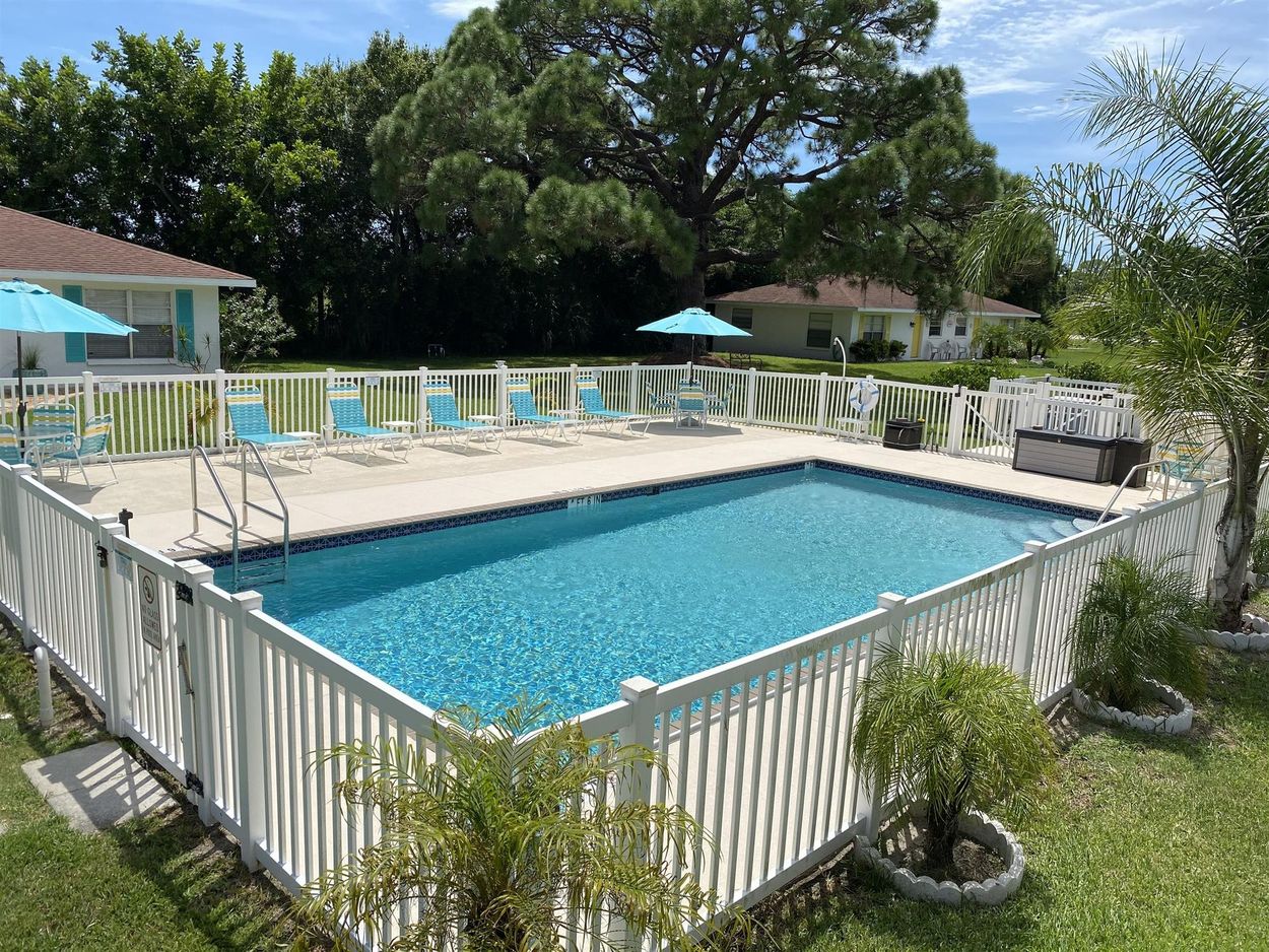 Olympic sized heated pool and fenced-in deck