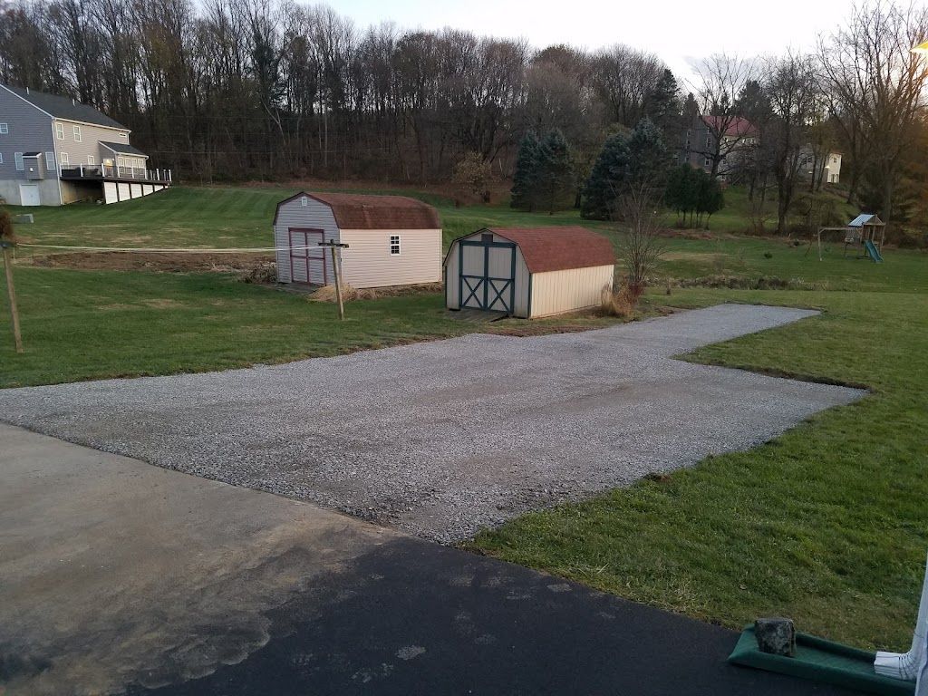 A Gravel Driveway with a Barn in the Background — Kutztown, PA — B Young Paving