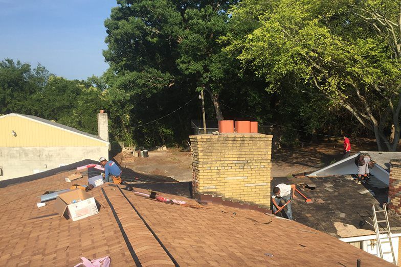 Man repairing the house roof