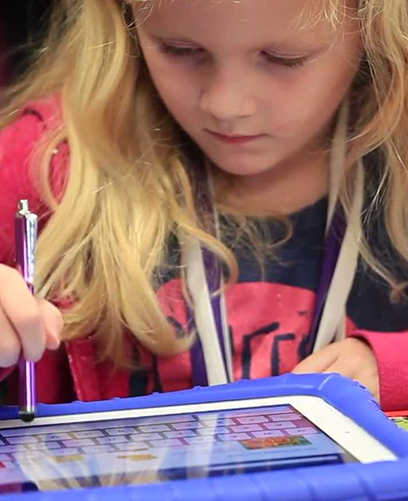a little girl writing