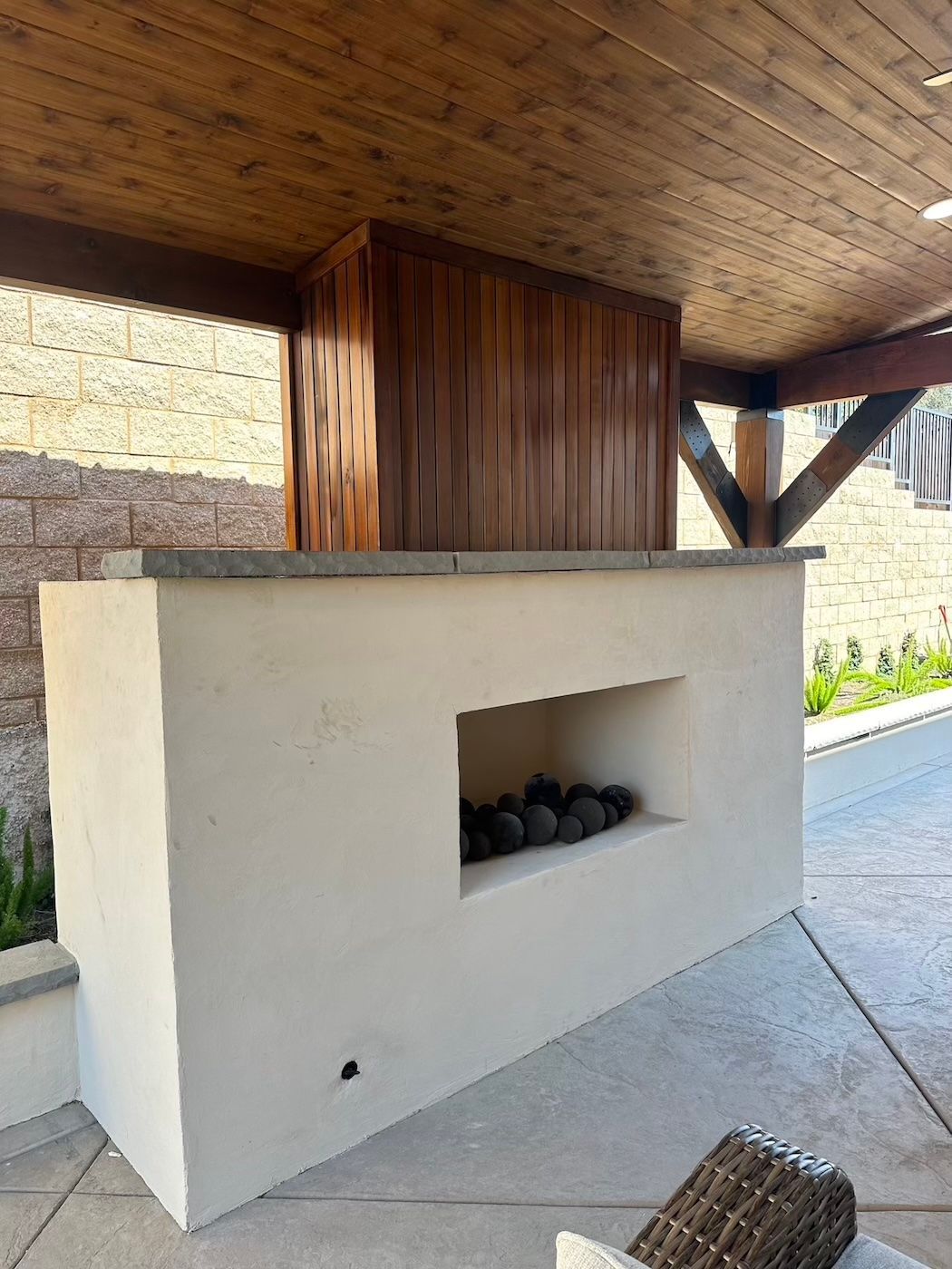 There is a fireplace in the middle of the room.