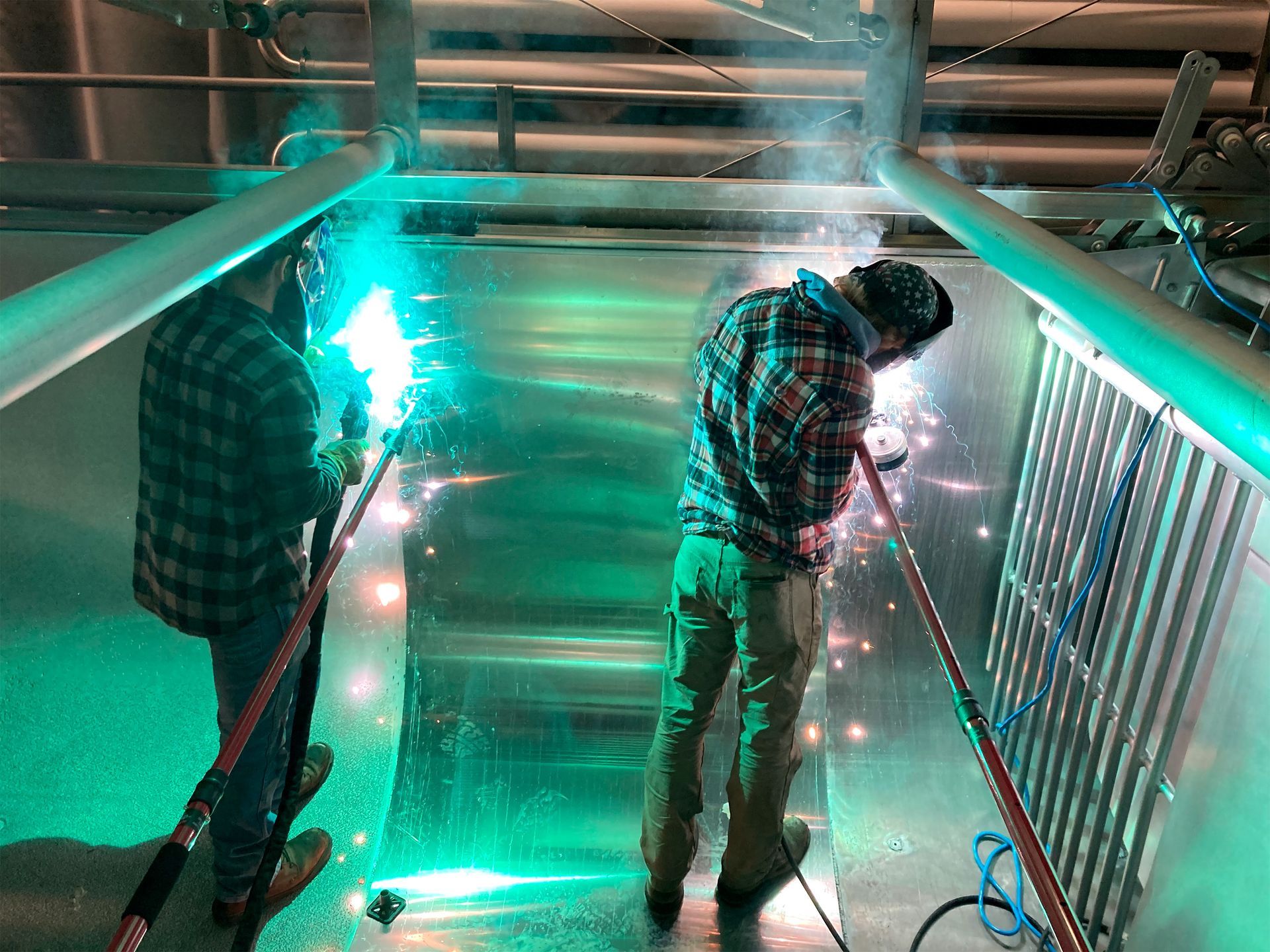 men welding