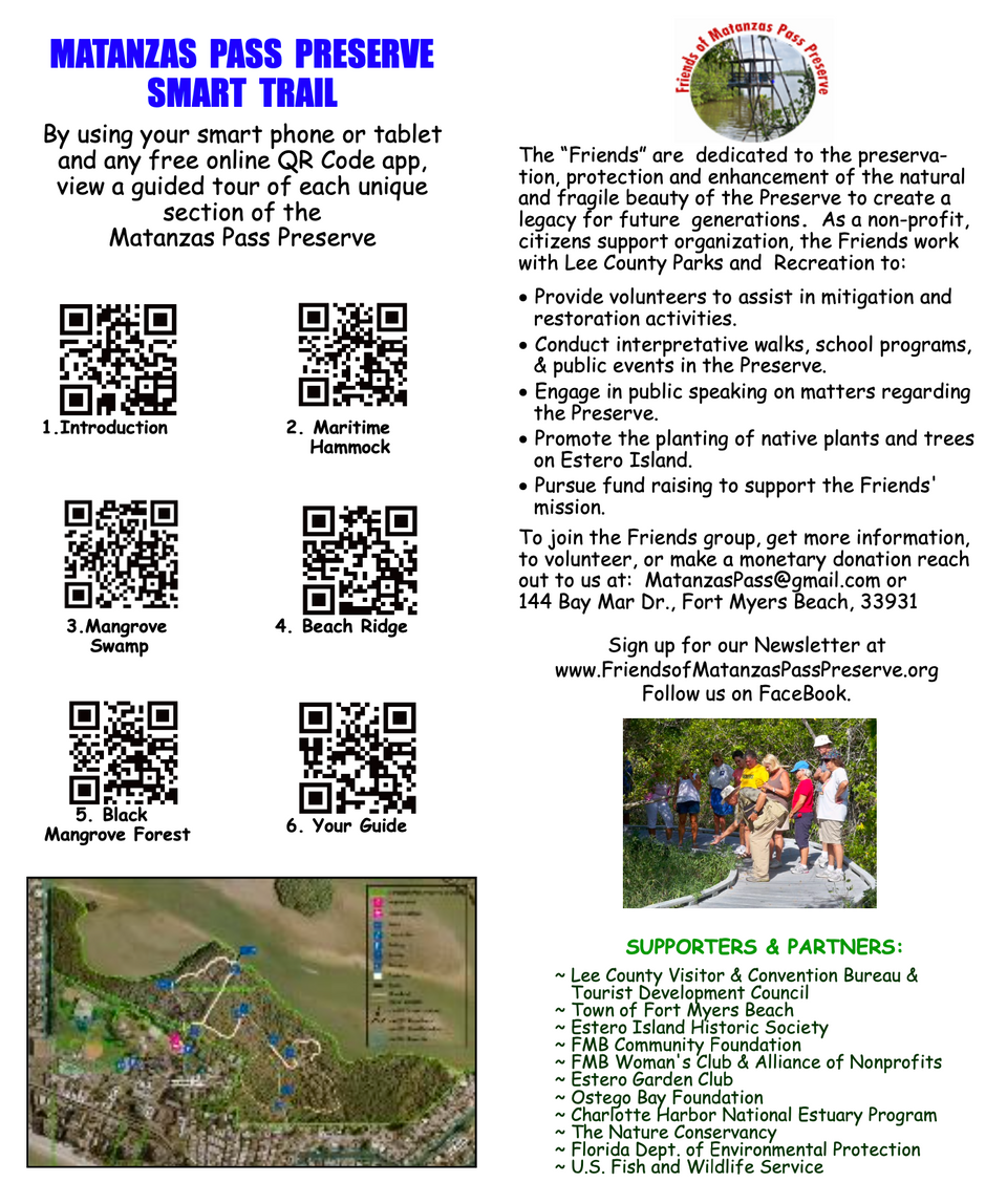 A brochure with qr codes and a picture of a group of people walking on a trail.