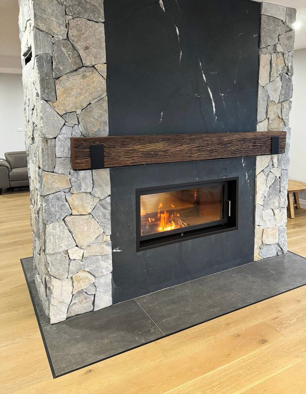 feature wall with a fireplace — Content Stone In Trenayr, NSW