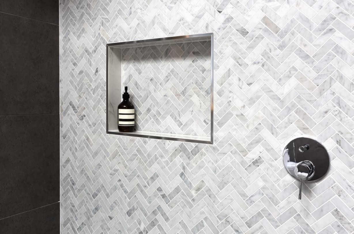 There Is A Bottle Of Soap In The Niche In The Shower — Content Stone In Trenayr, NSW