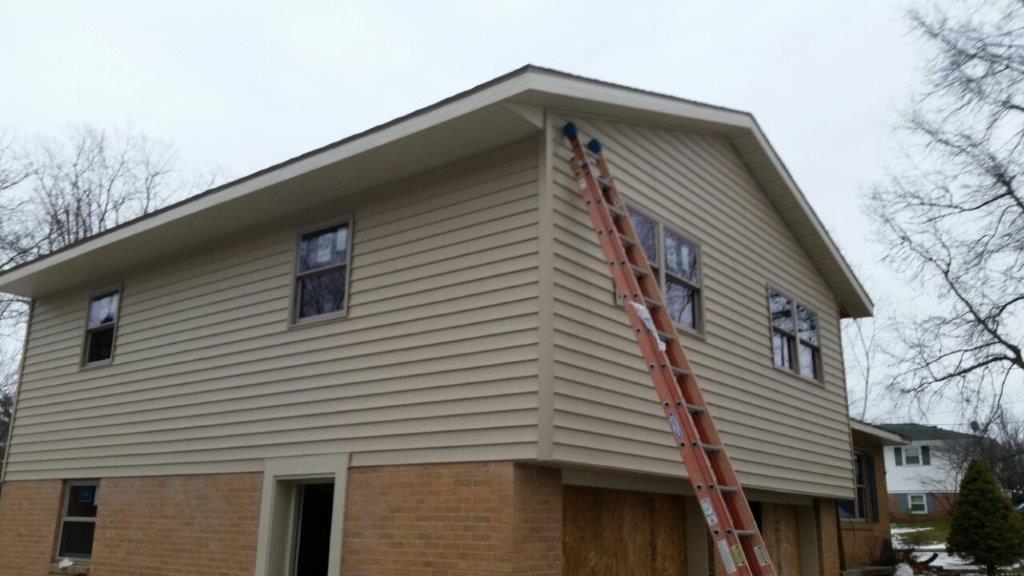House with Ladder — Mansfield, OH — Zara Construction, Inc.