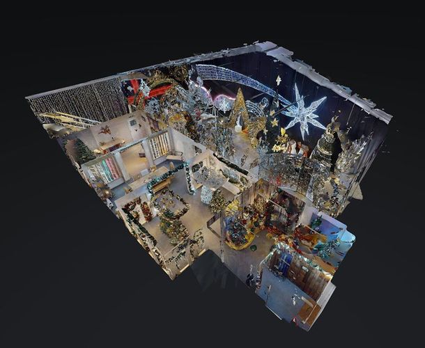 An aerial view of a room decorated for christmas.