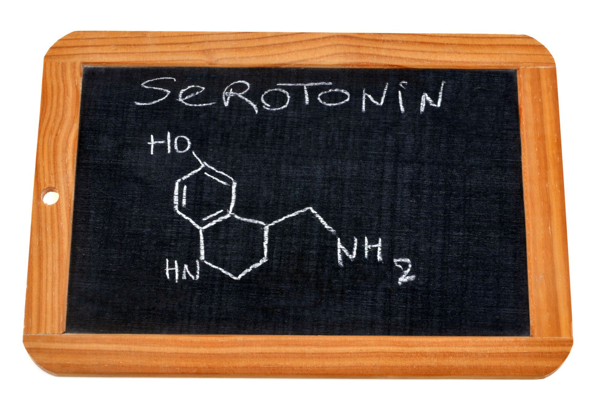 A blackboard with the chemical structure of serotonin written on it