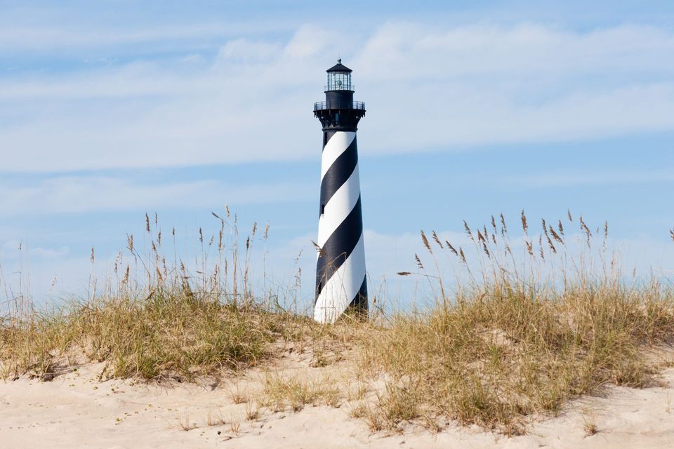 Cape Hatteras Lighthouse rising above the dunes in Buxton on Hatteras Island