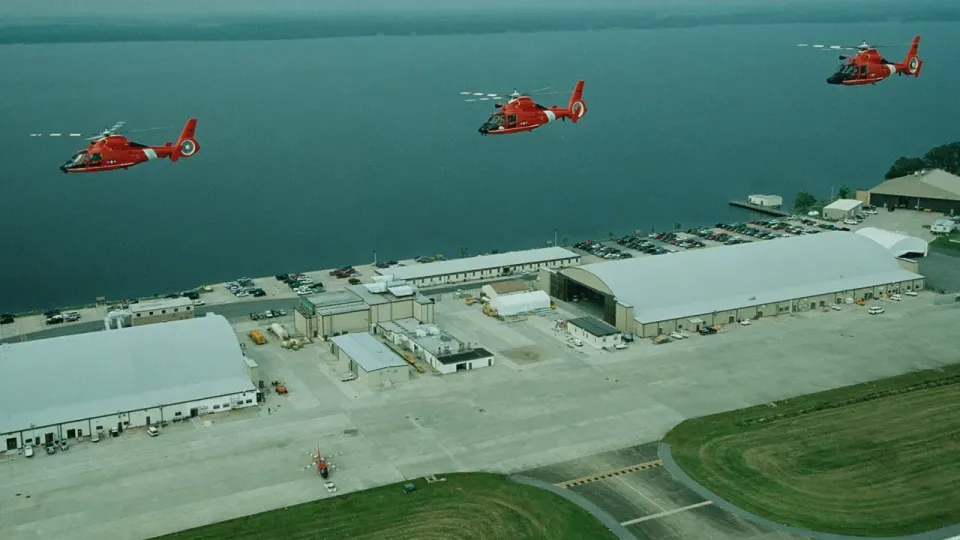 HH-65 helicopters flying over Coast Guard Air Station Elizabeth City