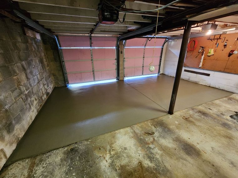 Epoxy Coatings: Decorative concrete retaining wall with a durable finished surface