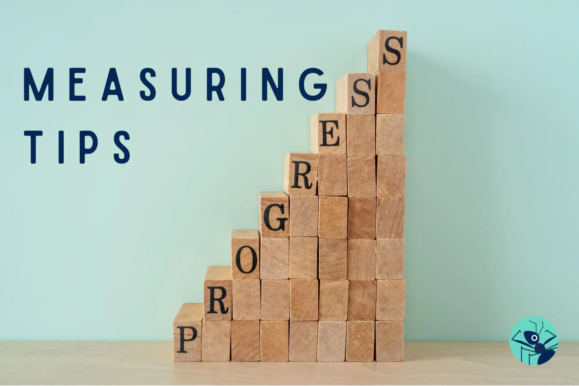 A stack of wooden blocks with the words measuring tips written on them.