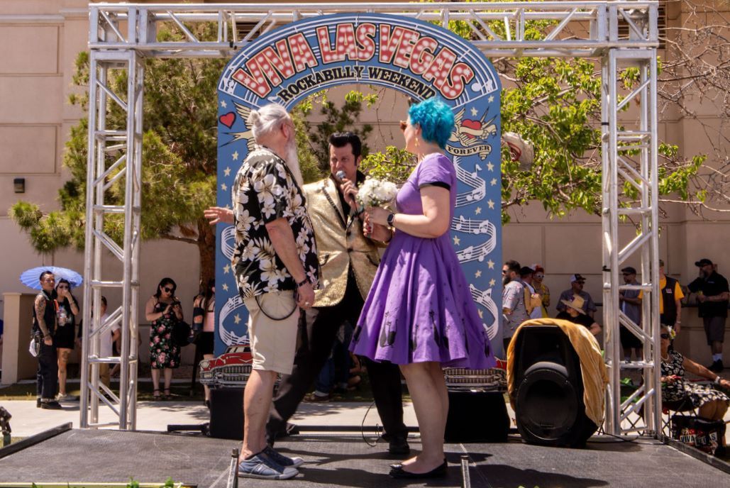 Sign promoting weddings at the Viva Las Vegas Car Show, offering Elvis, Rockabilly, and Pinup wedding themes.