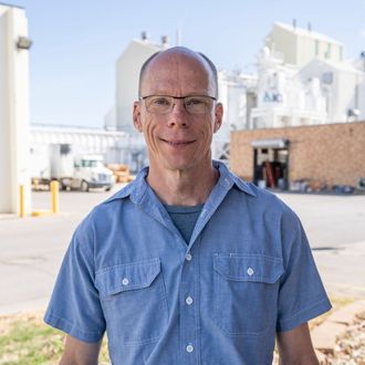 ICL employee smiles for the camera.