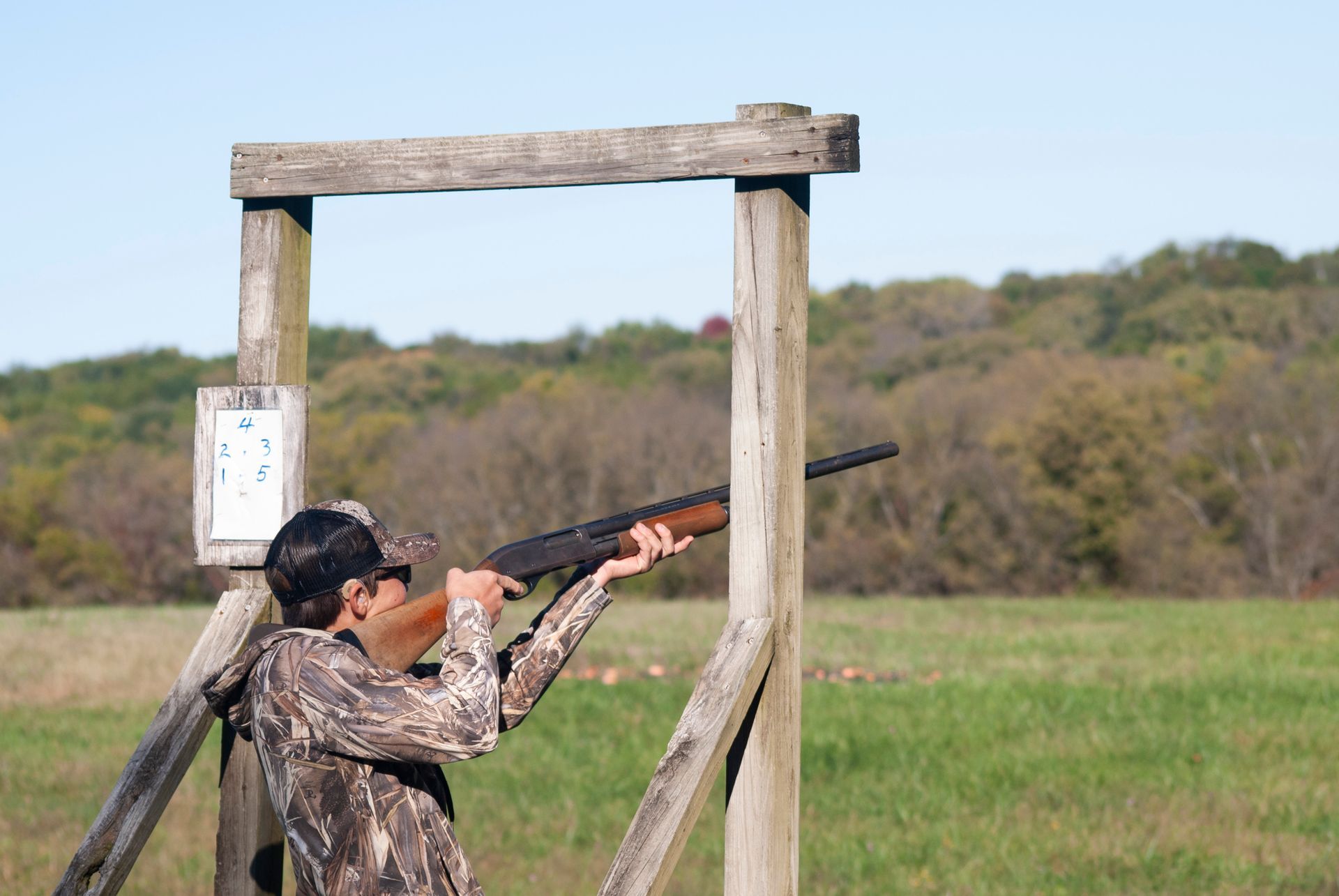 A man is skeet shooting.